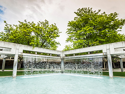 decorative image of the inner courtyard waterfall and pool